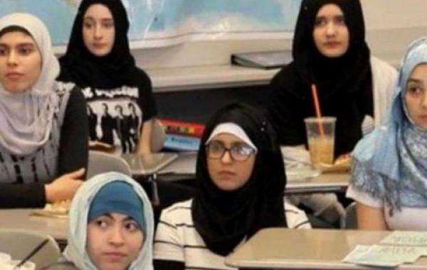 Eleva germana sfatuita sa-si puna hijab ca sa n-o bata musulmanii